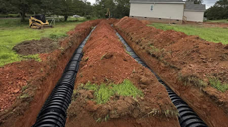 Drain Field Repairs, and Installations, and Relocations.